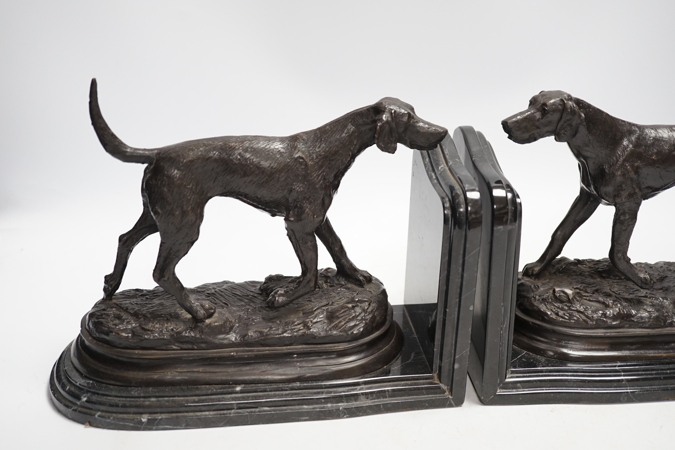 After Pierre-Jules Mêne (1810-1879), a pair of bronze models of hunting hounds